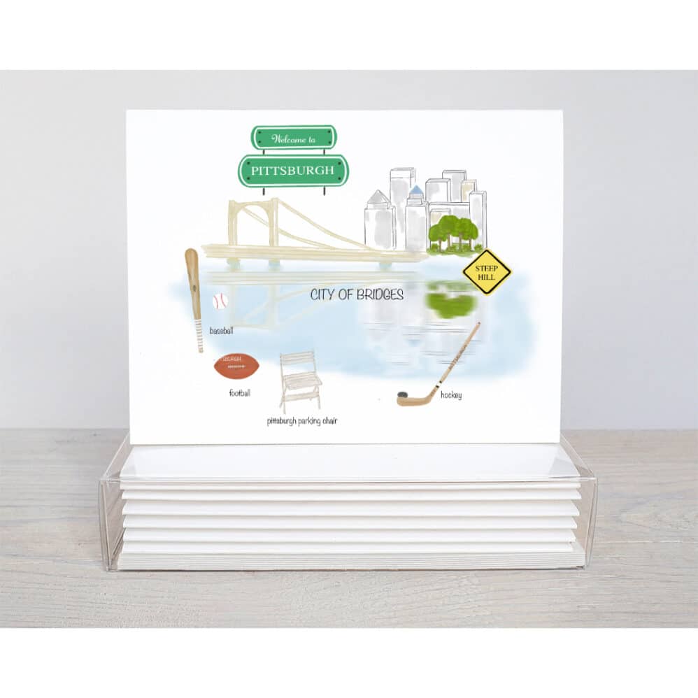 WELCOME TO PGH NOTE CARD featuring the skyline of downtown pittsburgh with things Pittsburgh is noted for: football, baseball, hockey, steep hills and the Pittsburgh Parking Chair.