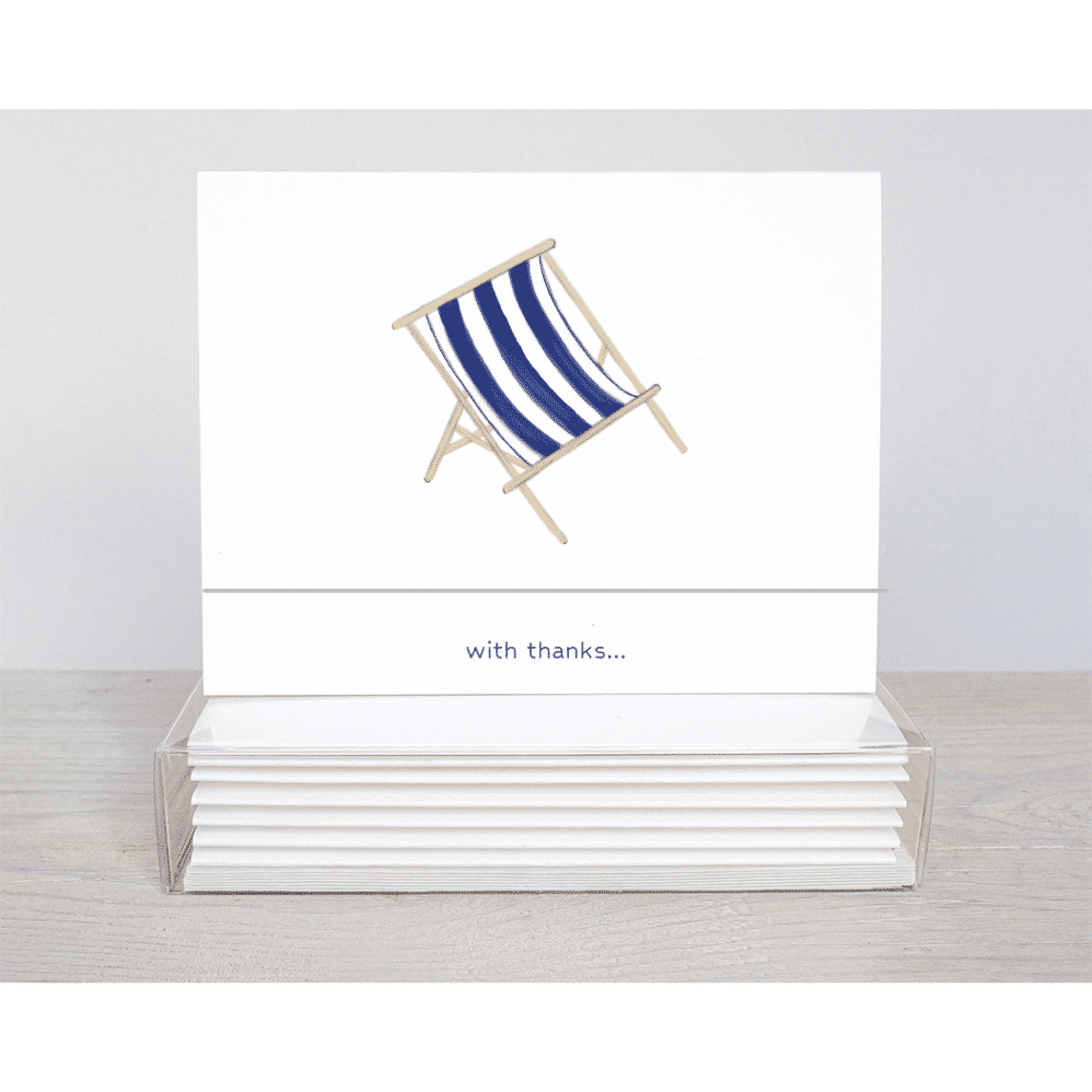 An adorable navy blue and white stripped beach chair thank you note card. The thank you is shown on the outside and inside of the card