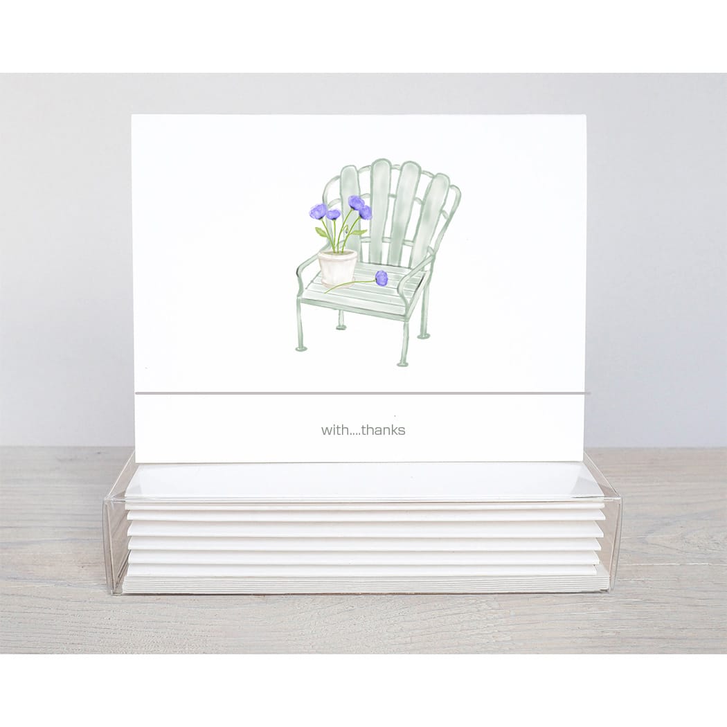 An old fashipm garden chair with purple allium in a flower pot sitting on the seat of a thank you note card